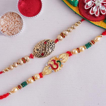 Golden OM and Meenakari Rakhi Set from Send Rakhi worldwide