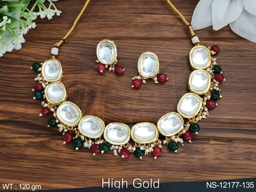 Kundan Jewelry High Gold Polish Fancy Design Party Wear Kundan Choker Necklace set from Manek Ratna