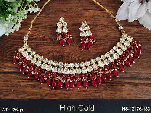 Kundan Jewelry High Gold Polish Fancy Design Party Wear Kundan Choker Necklace Set from Manek Ratna