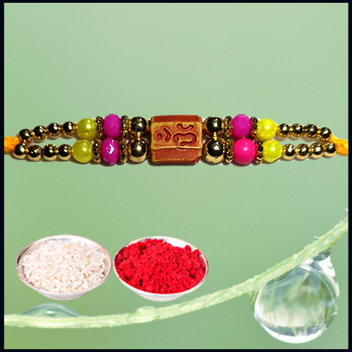 Delicate Wooden OM Rakhi with Beads from Rakhi Store